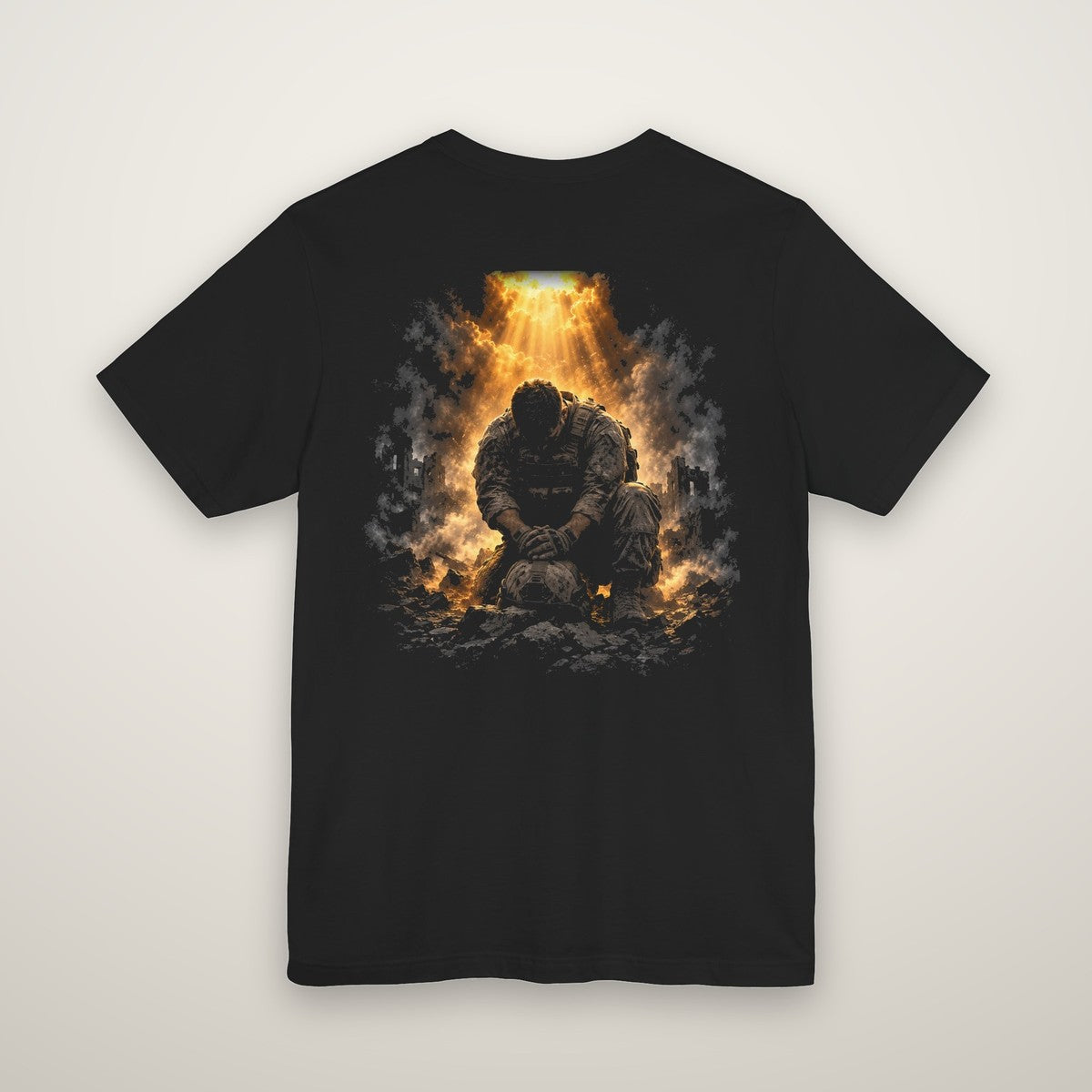 Back print: a soldier on his knees praying over his helmet in falling golden light