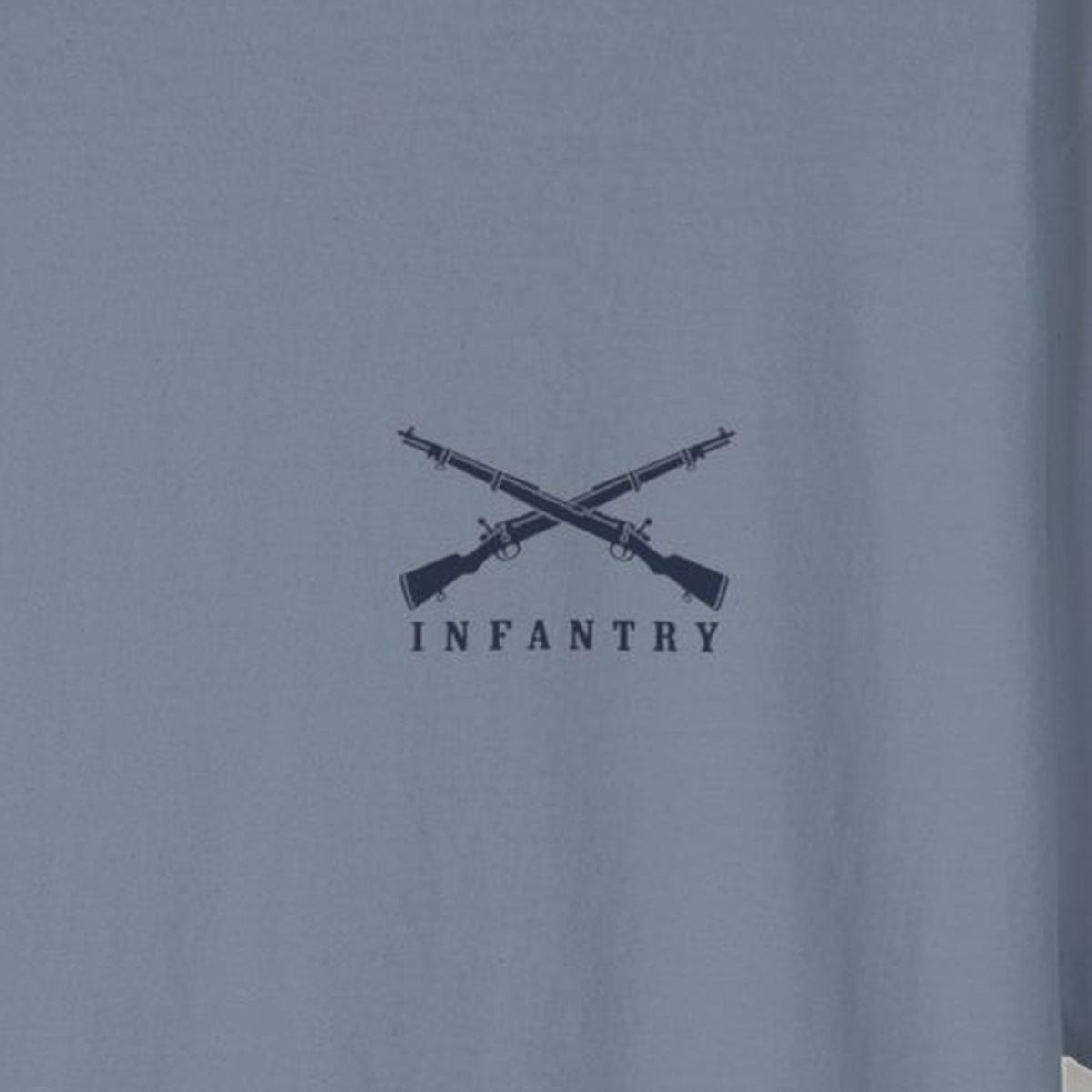 Close-up of the Infantry crossed rifles chest print